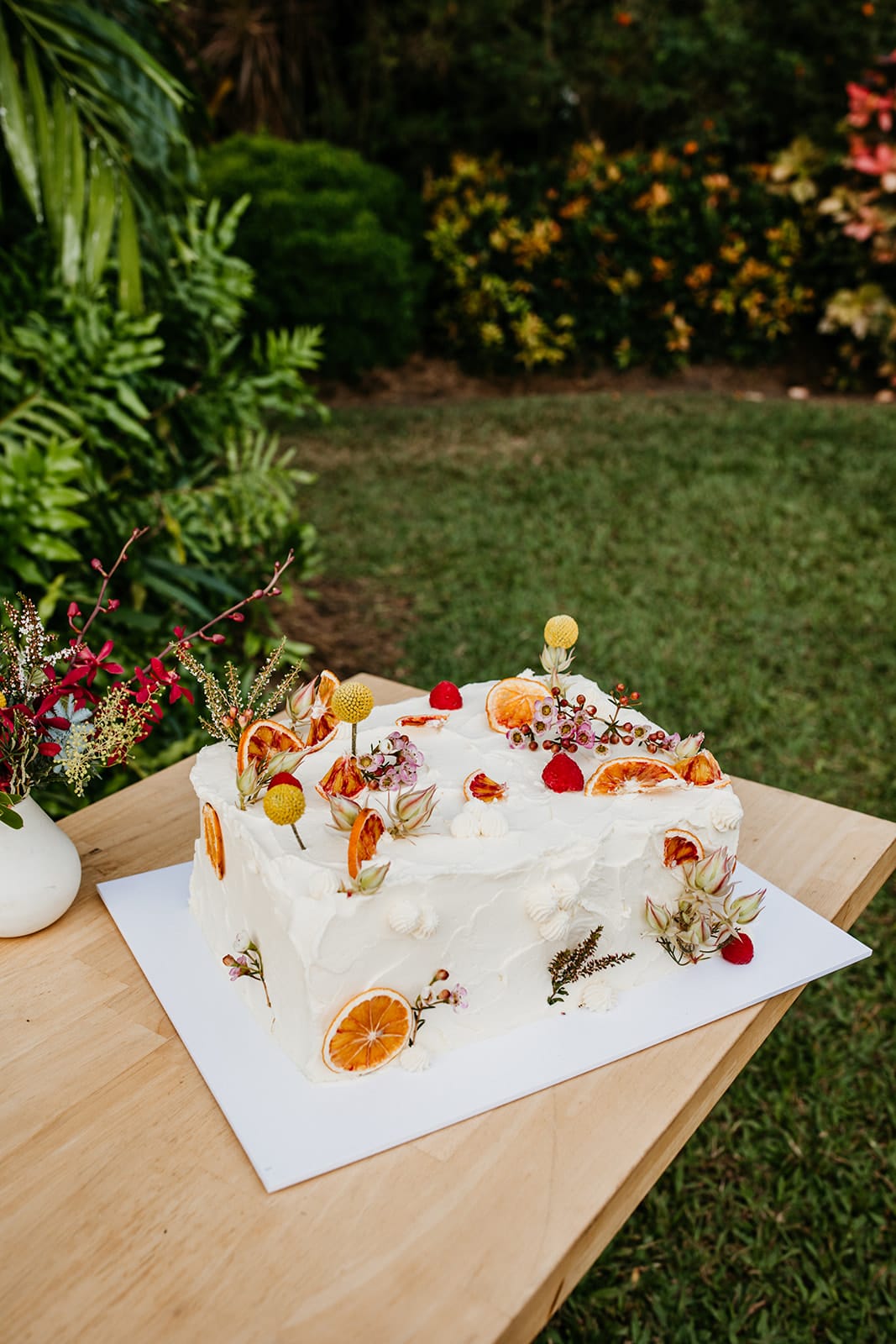 Decorative cake with flowers and fruits by Jim Jams