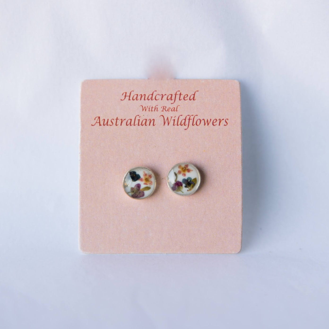 Beija Flor Pale-pink Oval-Shaped Wildflower Stud Earrings by Darwin Artisan