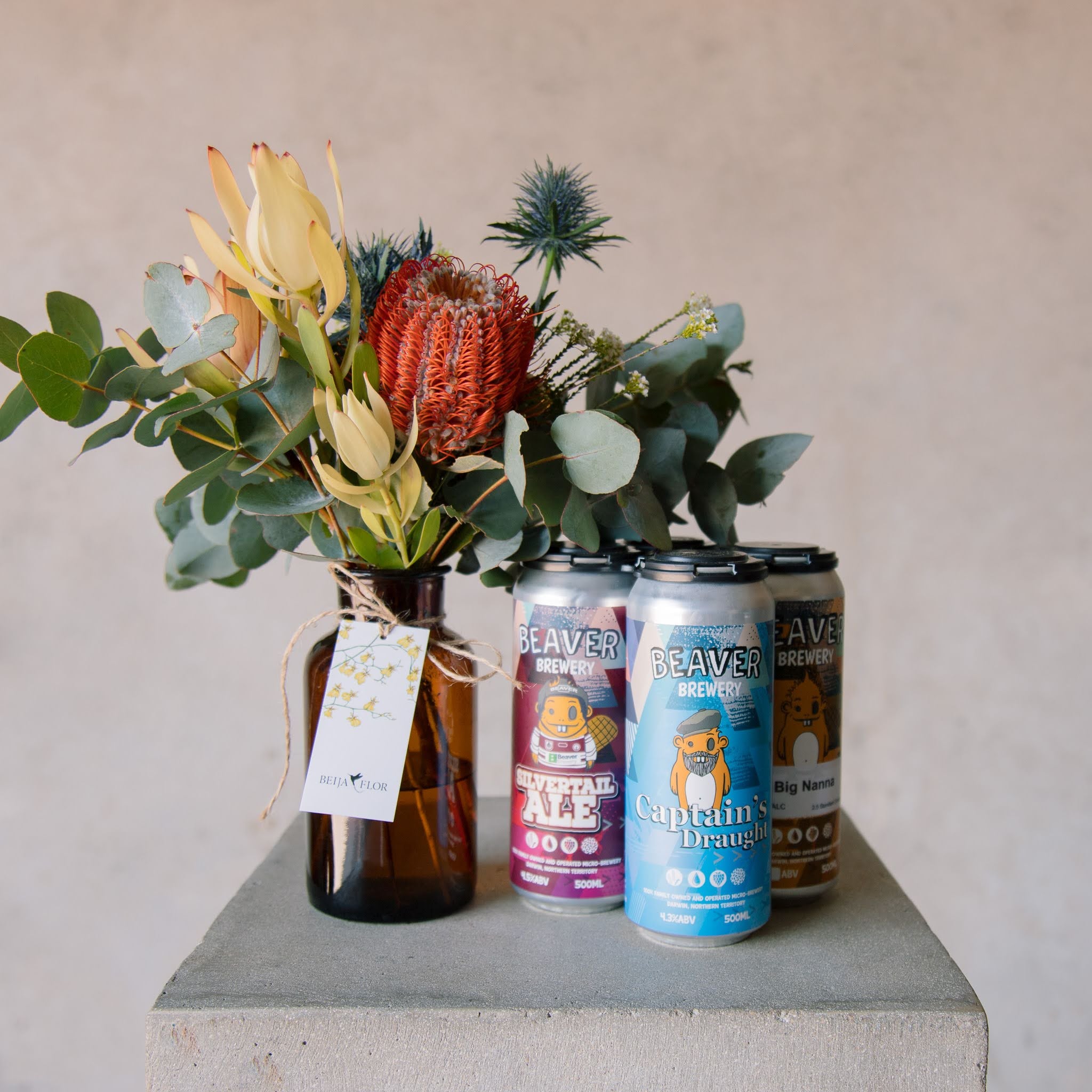 A gift box containing a native flowers and an assorted craft beers from Beaver Brewery.