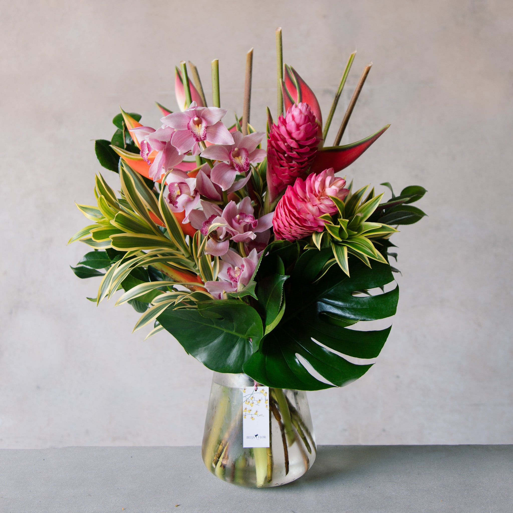 Large tropical vase of flowers