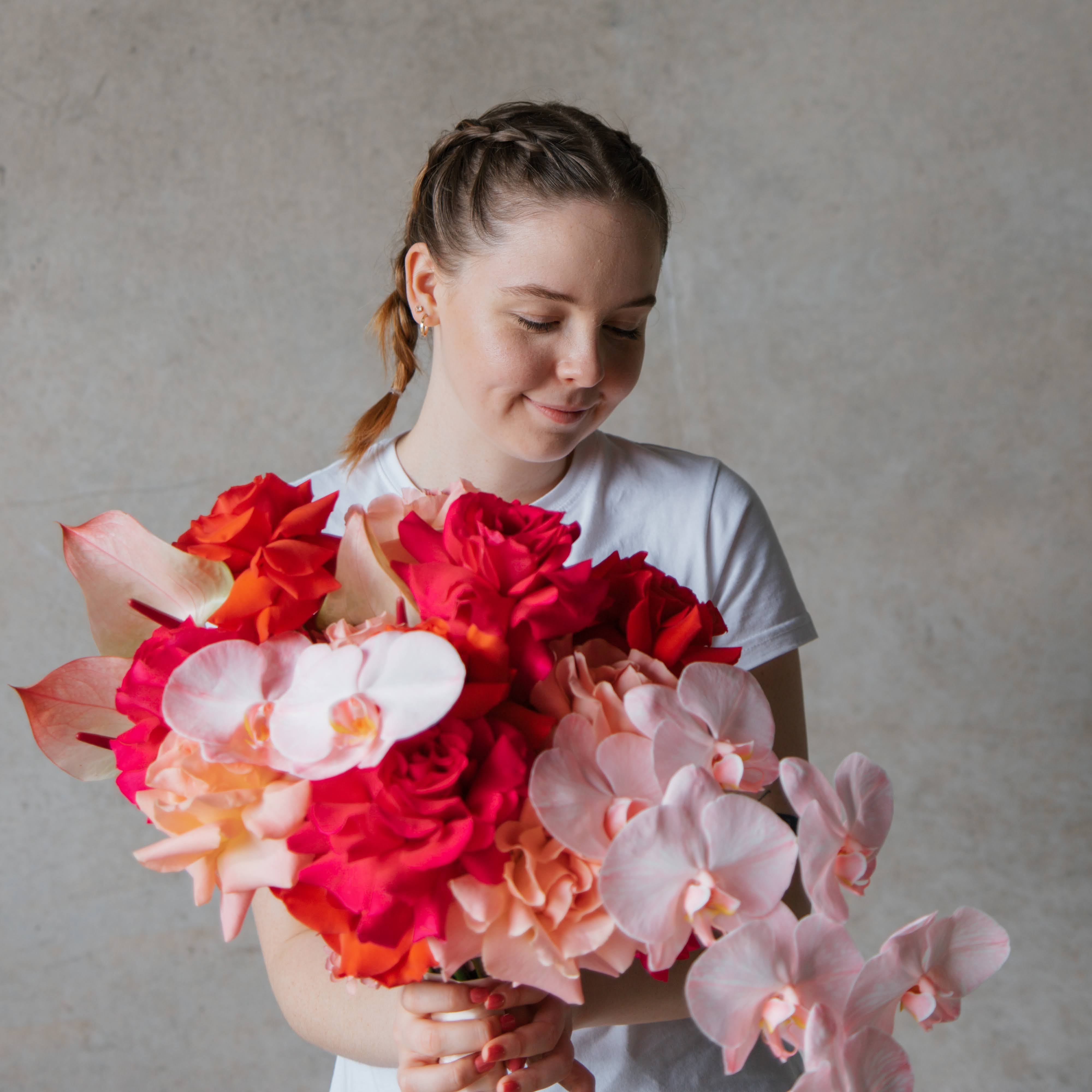 Mary Fryar Beija Flor Florist in a white and pink floyd roses