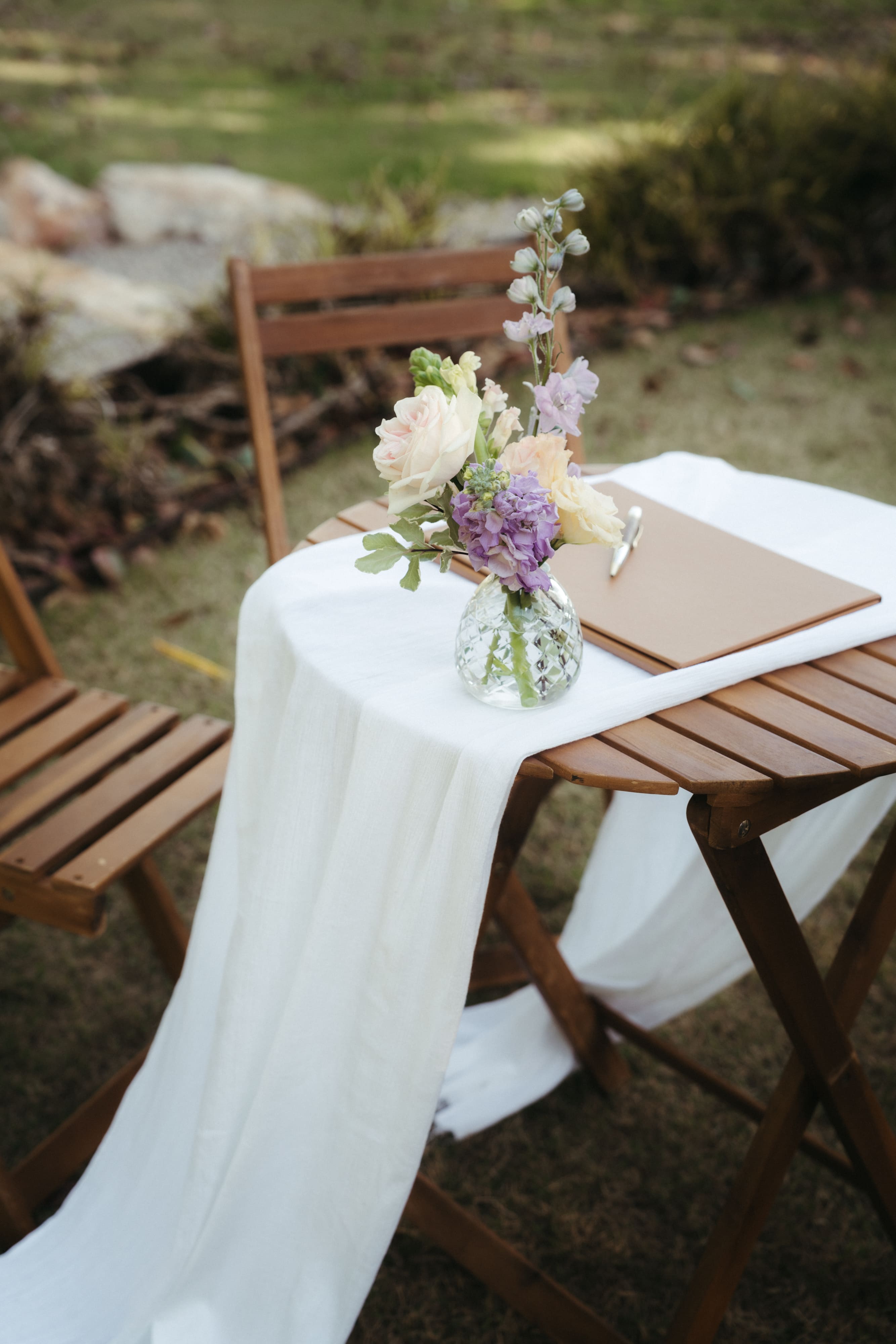 Accent vase of summer blooms for wedding signing table at Pee Wees