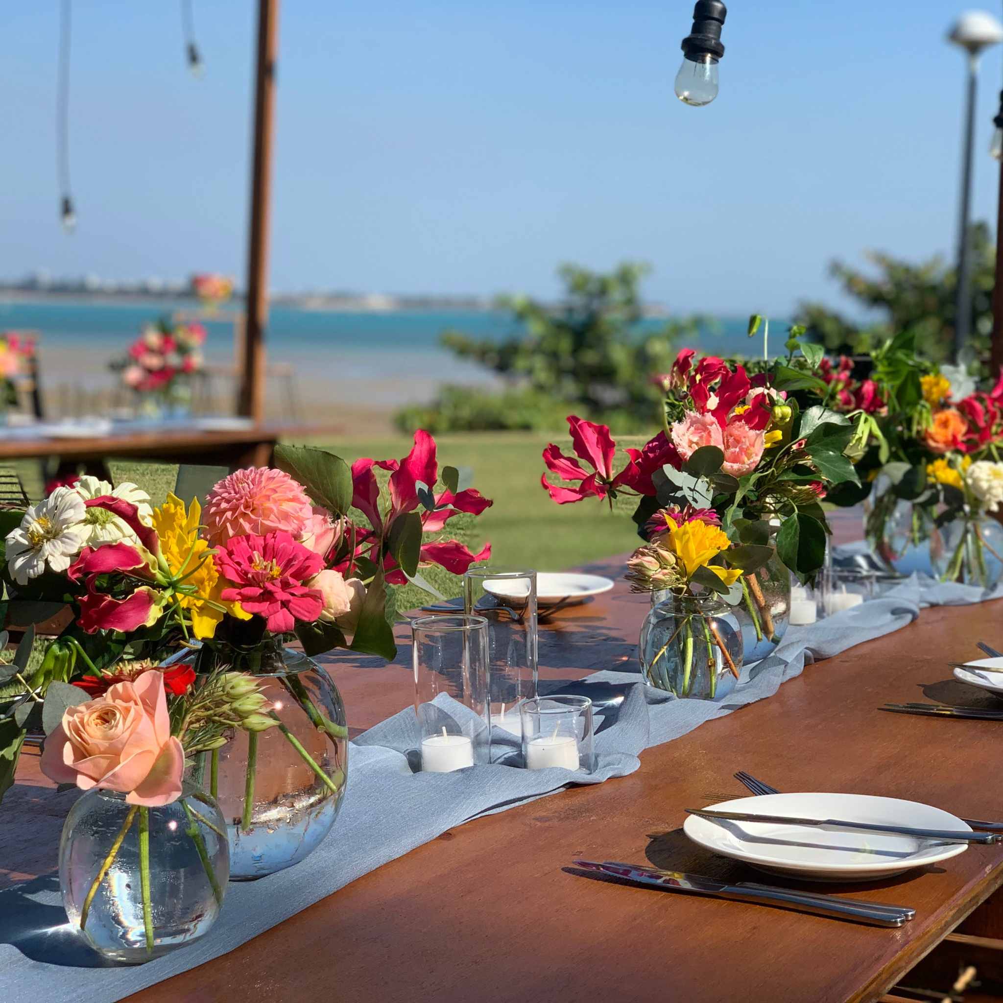 Beija Flor - Darwin wedding & event hire - Bubble Vase Small Centrepieces in Red Florals