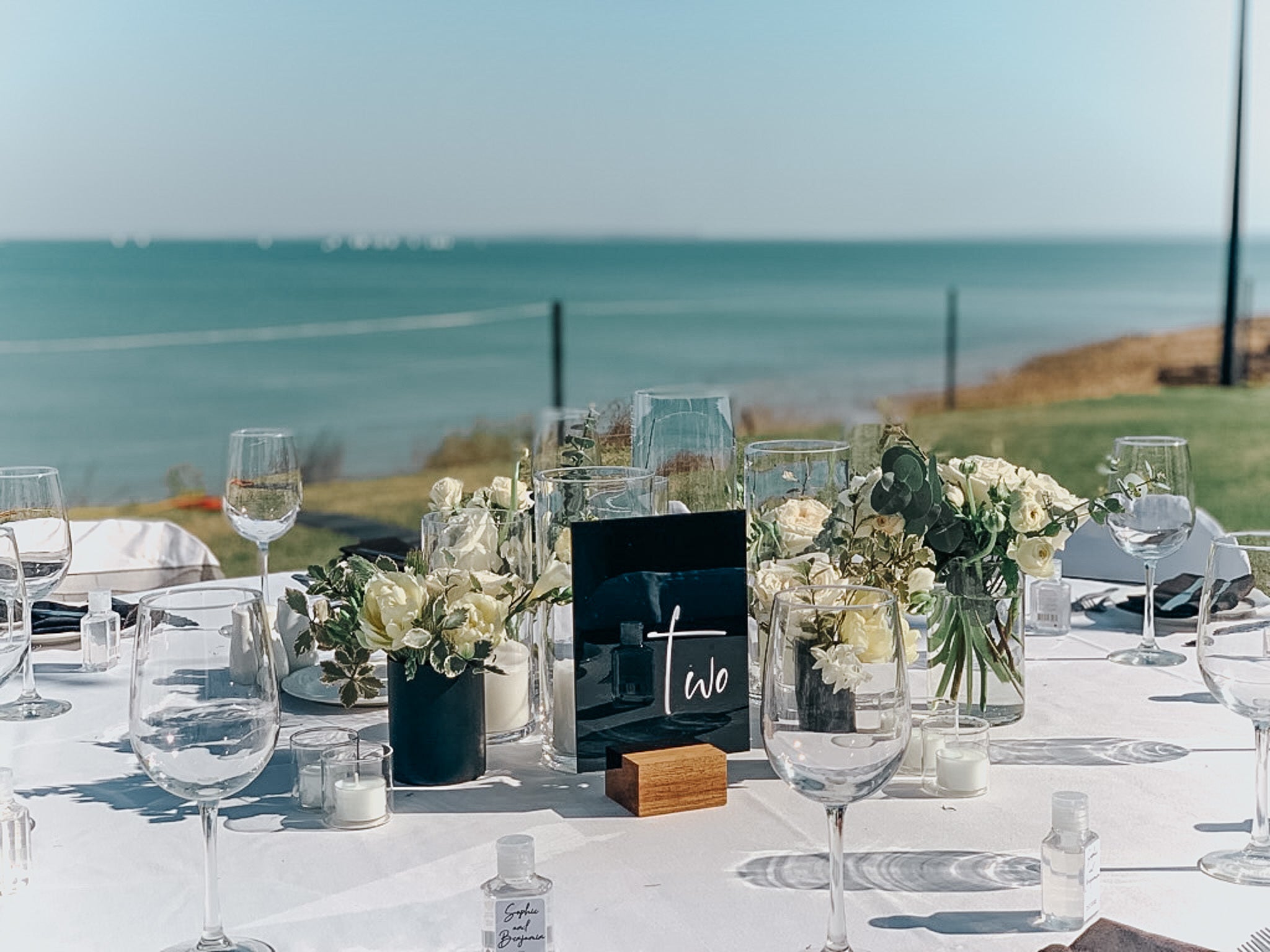 Beija Flor Matte Black Candlestick Vase Arrangements and Table Sign