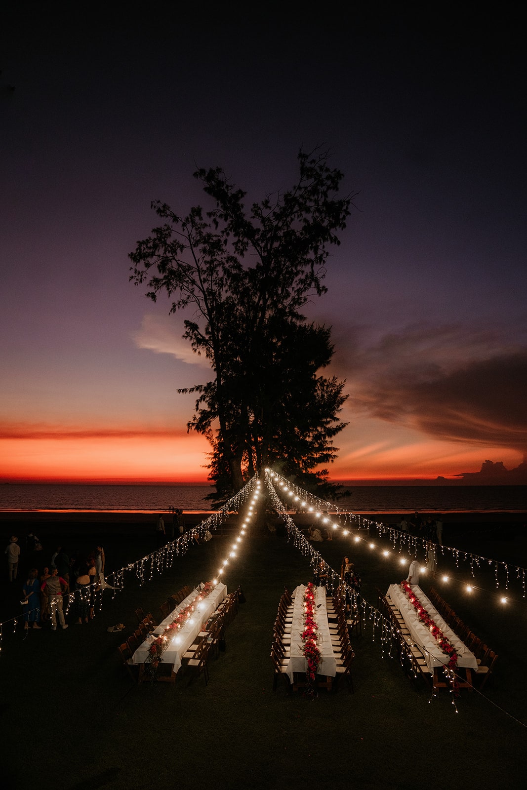 Candlelit wedding reception at sunset at Casuarina Surf Lifesaving Club