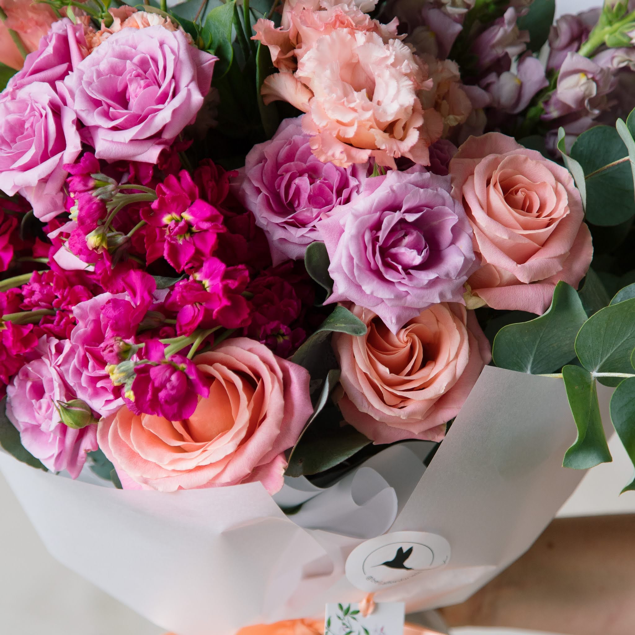 Mother's day flower bouquet with pink, peach and lilac. 