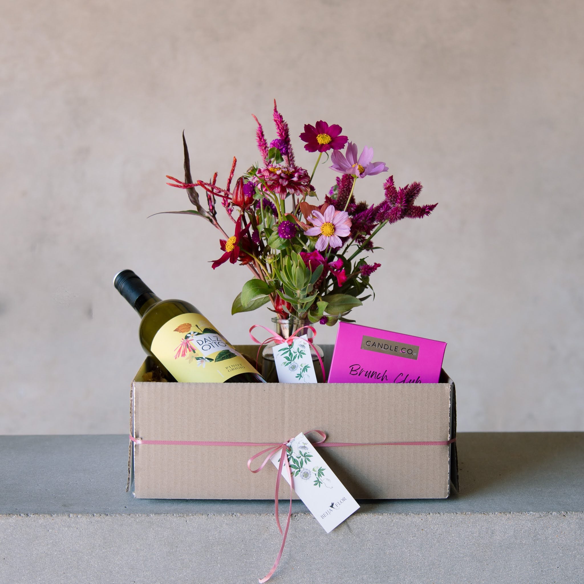 candle wine and local flowers gift box