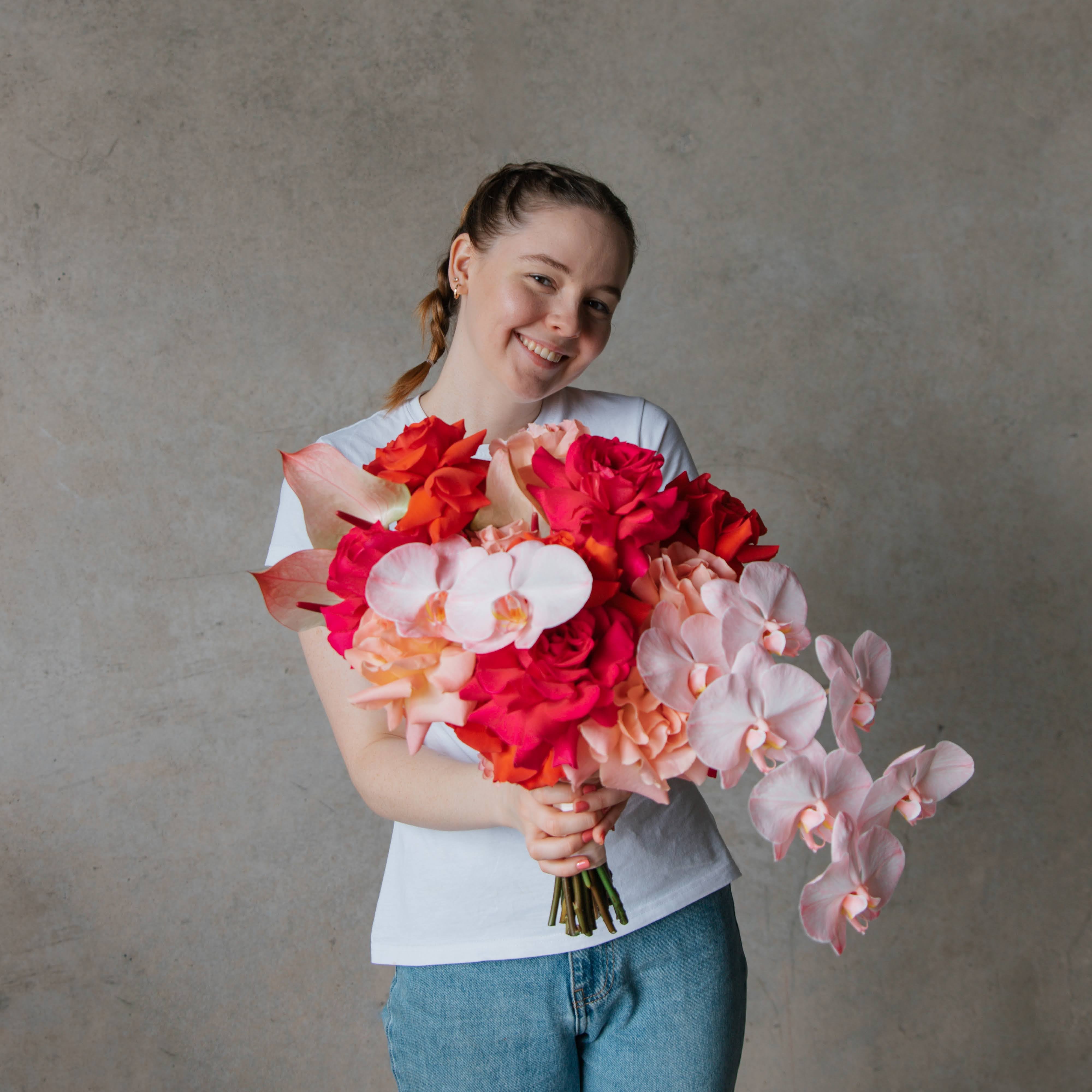 Mary Fryar Beija Flor Florist with her Floral Arrangement