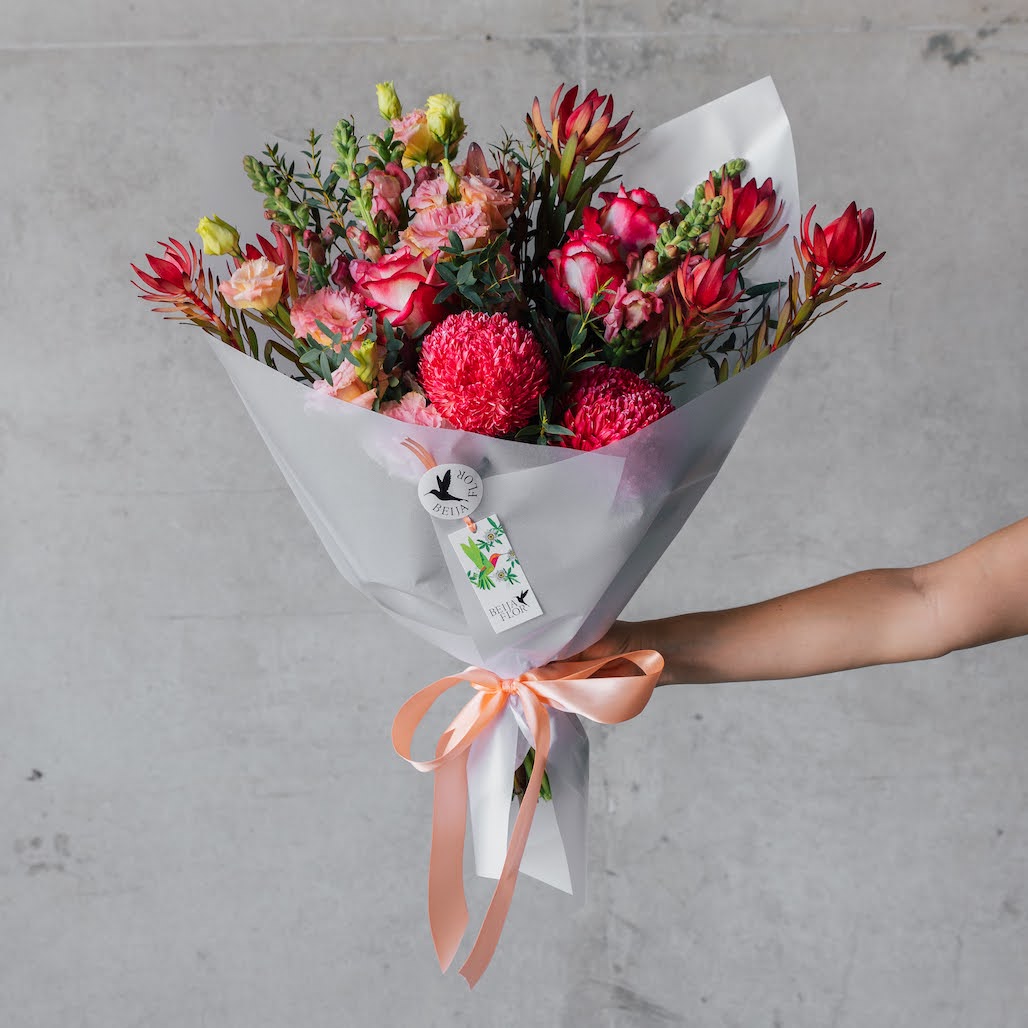 Bright pink gift wrapped bouquet