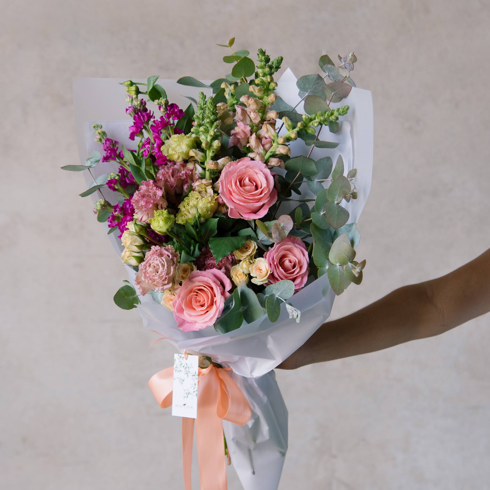Mother's Day bouquet with roses, lisianthus