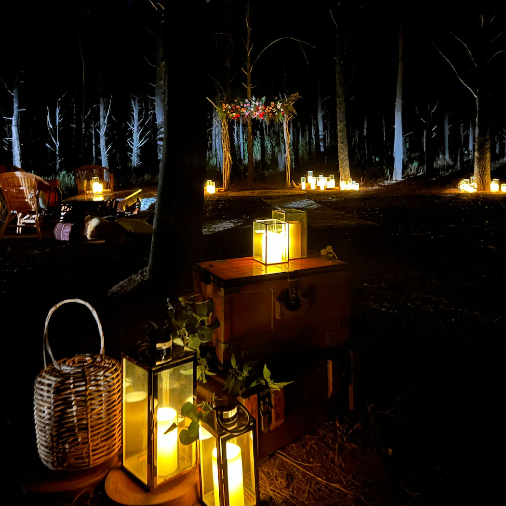 Beija Flor Darwin - Hire and Prop Items - Outdoor night scene with glowing lanterns, wicker baskets, and Branches Arbour