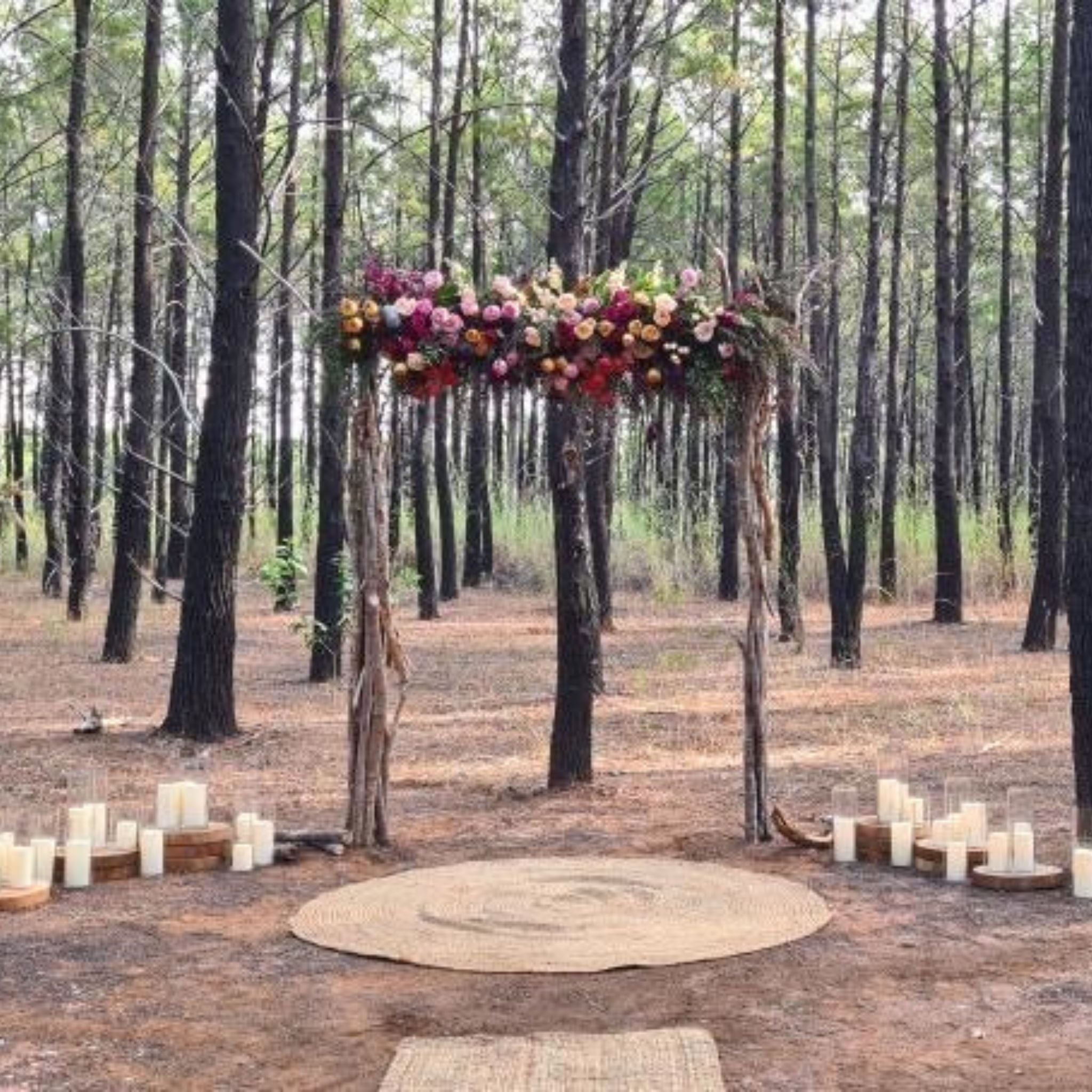 Beija Flor Darwin - Hire and Prop Items - Woodland wedding arch with colourful flowers and pillar candles