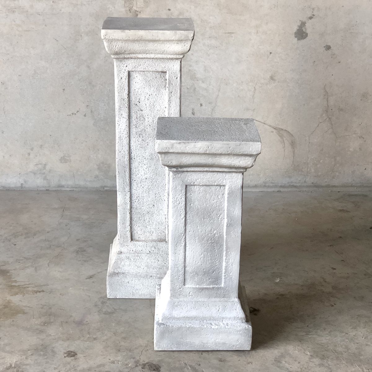 set of stone effect plinths for wedding and event decor