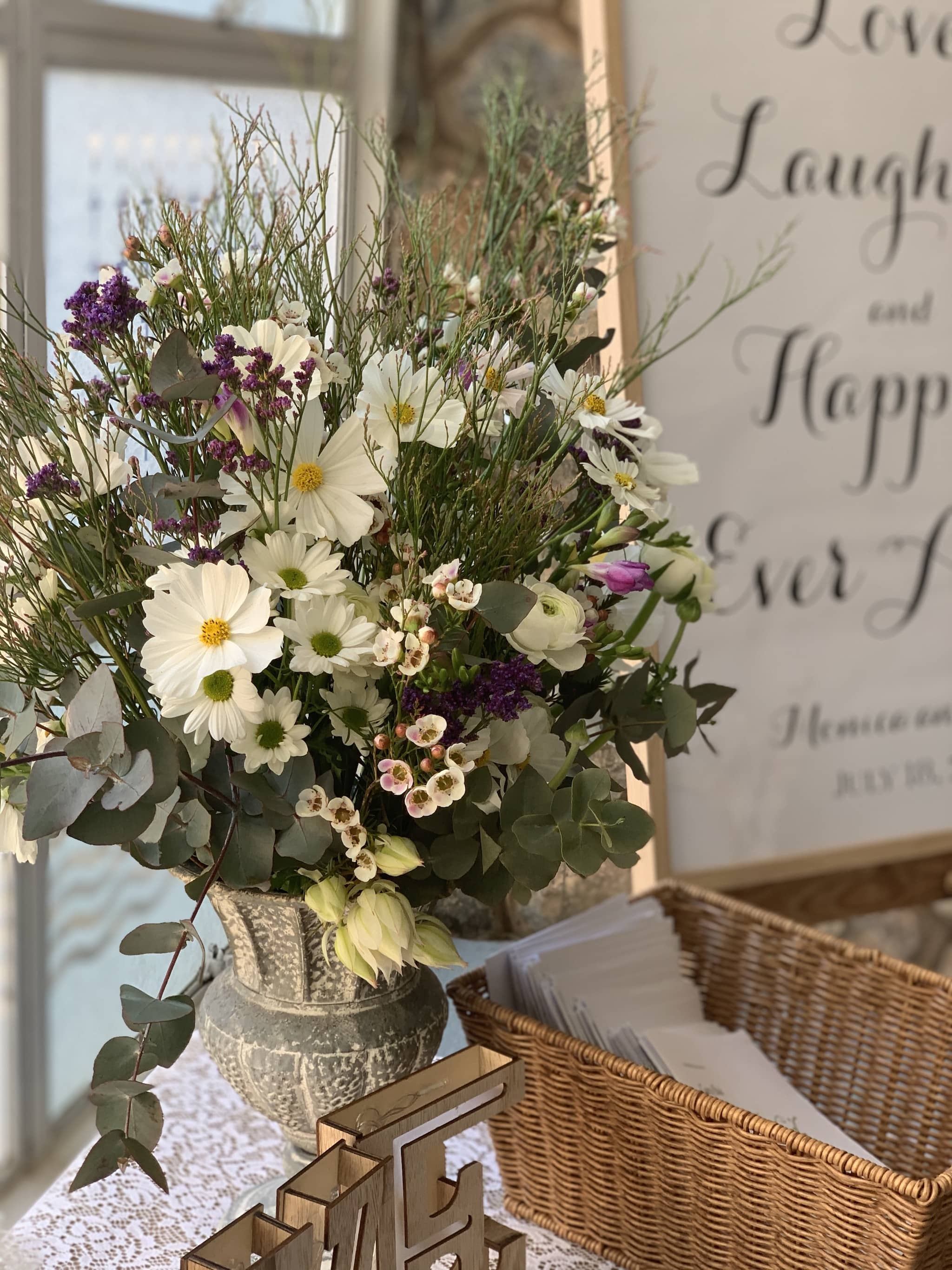 Petite urn filled with rustic fresh flowers